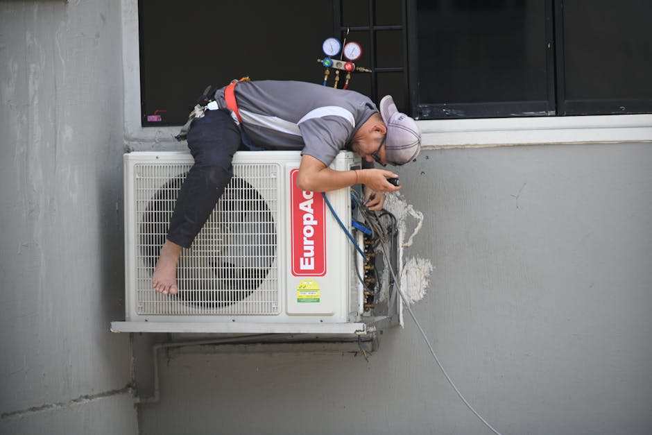 Professional HVAC technician inspecting equipment